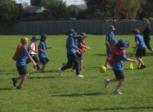 children-playing-soccer